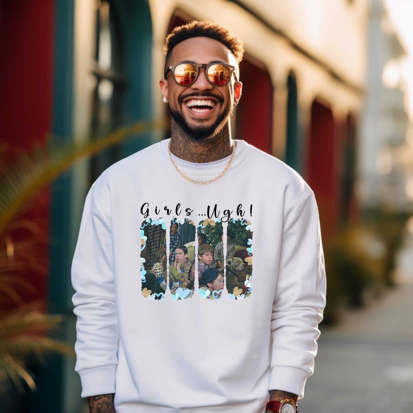 Man rocking ‘Girls Ugh!’ sweatshirt in streetwear style with sunglasses and a chain.